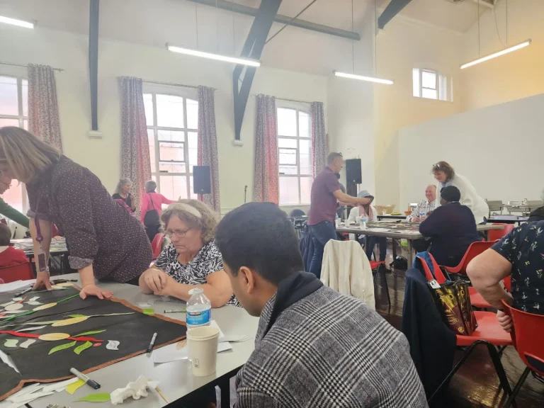 Participants learning together at a community workshop