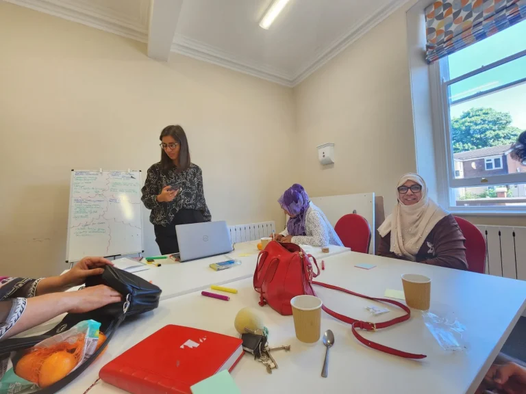 Participants learning together at a community workshop
