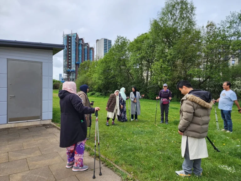 Community members taking part in an outdoor walk or activity